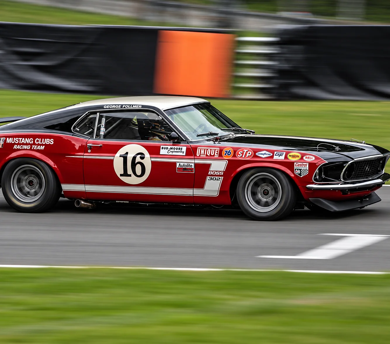 Number 16 Mustang Boss 302 racing on track